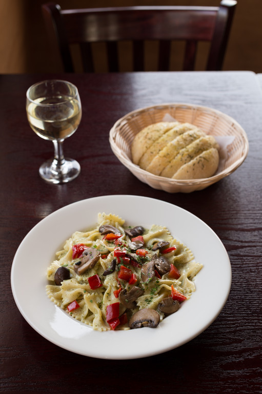 Pasta Bowl with creamy basil pesto sauce, mushrooms and roasted red peppers