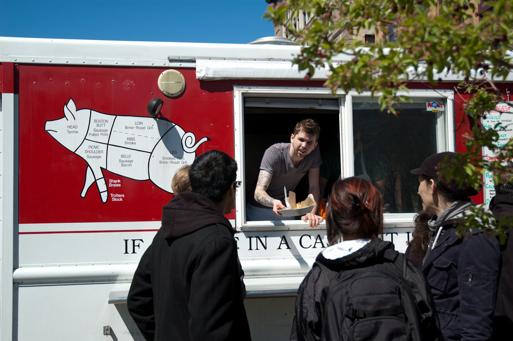 Food Truck Tuesdays, organized by the Downcity marketing group, brings trucks like Hewtin's Dogs Mobile, Poco Loco, Fancheezical and more to Grant's Block, attracting a hungry lunchtime crowd.