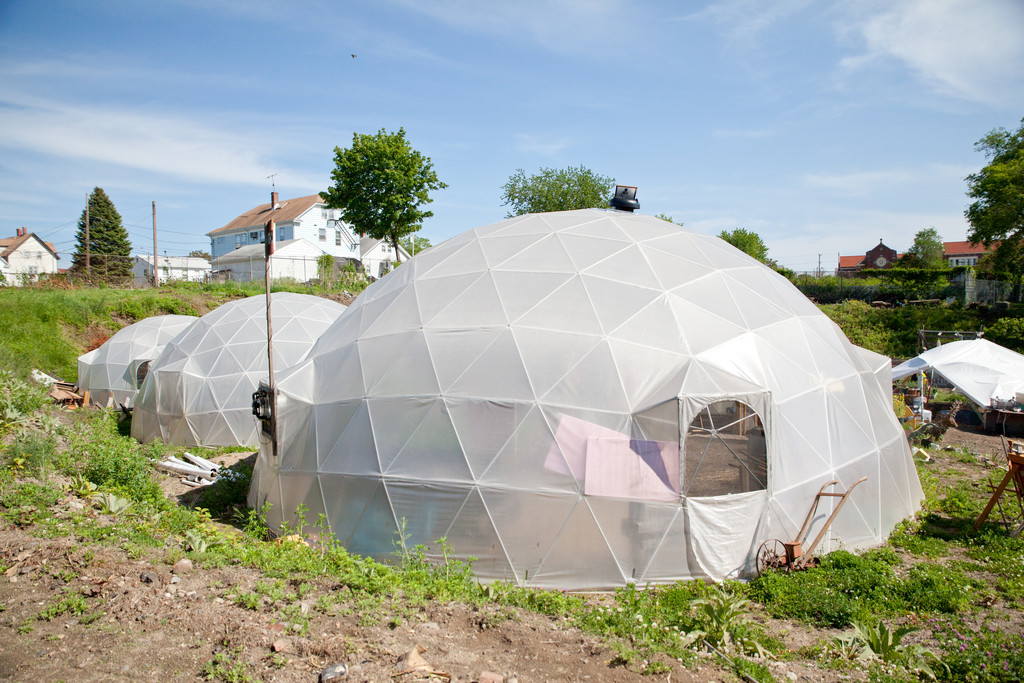 New Urban Farmers' Geodesic Dome Greenhouses are used as indoor grow spaces to start seedlings, mix compost and grow various plants throughout the year