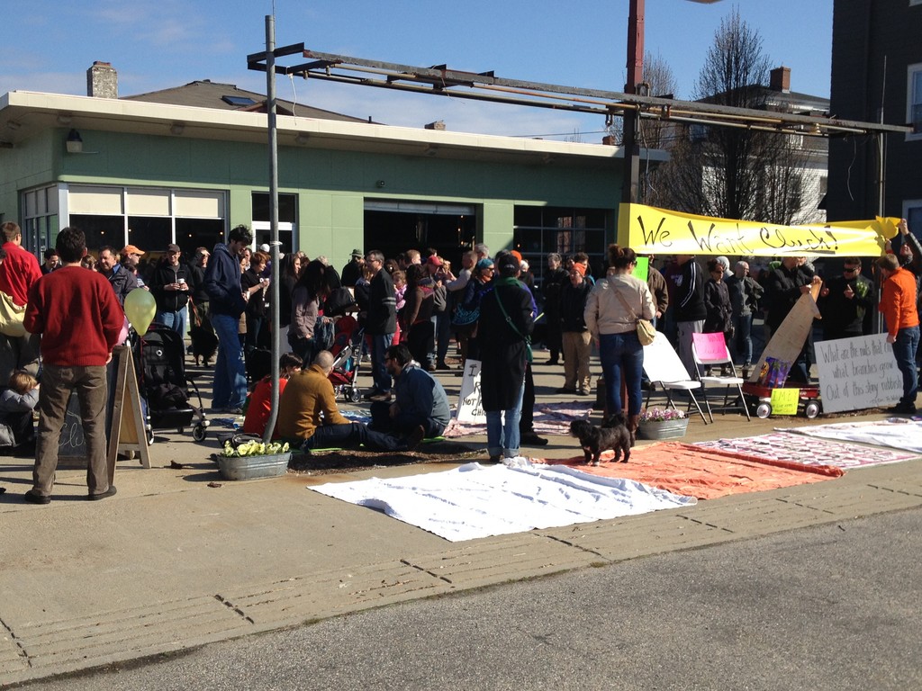 About 200 supporters rallied for cluck! on April 14