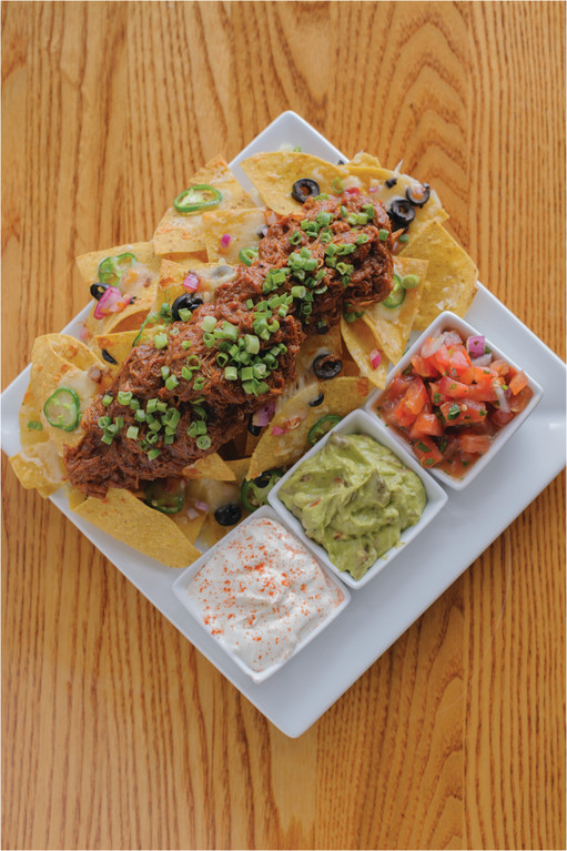 BBQ Pulled Pork Nachos with housemade corn tortilla chips