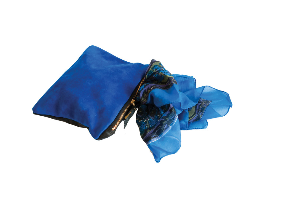 Bold in BlueBlue suede and black leather clutch, $84; printed silk scarf, $22 both a Shoppe Pioneer. Shoppe Pioneer As a premier women’s fashion and lifestyle boutique, Shoppe Pioneer offers exclusively curated fashion finds coupled with unique gifts perfect for the rest of life. 253 S. Main St., Providence. 274-7467.
