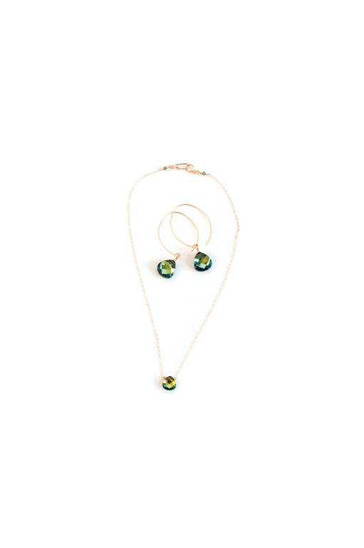 Gift: Classic gold filled Rainforest earrings; mini gold filled Swarovski Rainforest necklaceWhere to find it:  Noon Designs, INC.Price: Earrings $42; Necklace $40