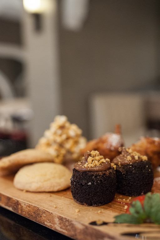 Chef's dessert board: fried oreos, caramel popcorn, snicker doodles and hazlenut cupcakes
￼