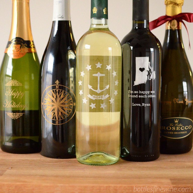 Bottles can engrave almost anything! Give a bottle of wine etched with Rhode Island's Hope Anchor, a Christmas greeting, or a special message. Order now!