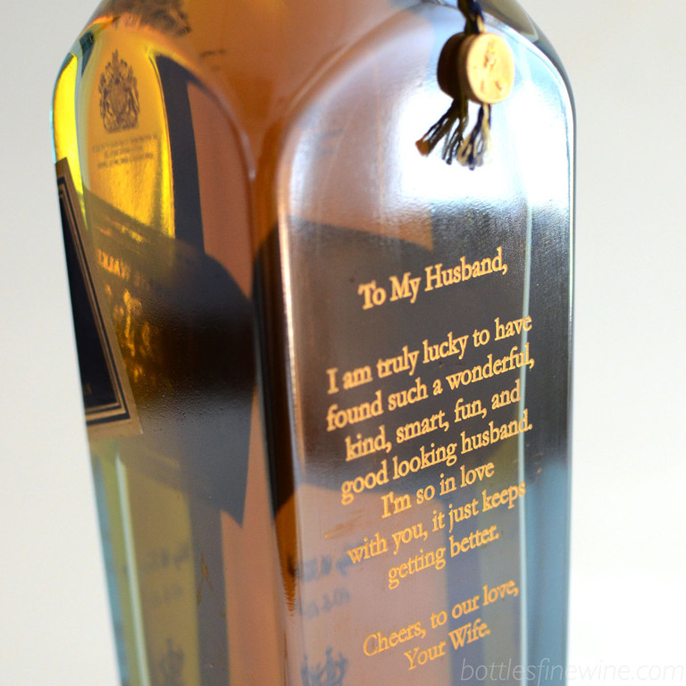 Cards are lame! Have your special message etched on the back of their favorite bottle of whiskey, wine, or champagne. Order now! Much better.