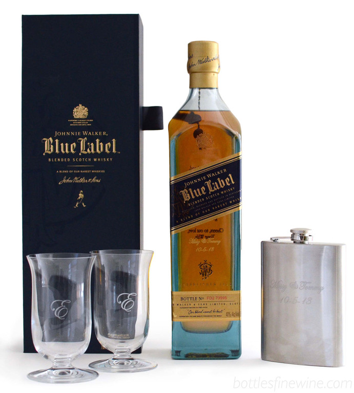 Give an engraved gift set! Monogrammed glasses, an engraved flask, and a bottle of Johnnie Walker Blue Label engraved with a personal note. Order now!