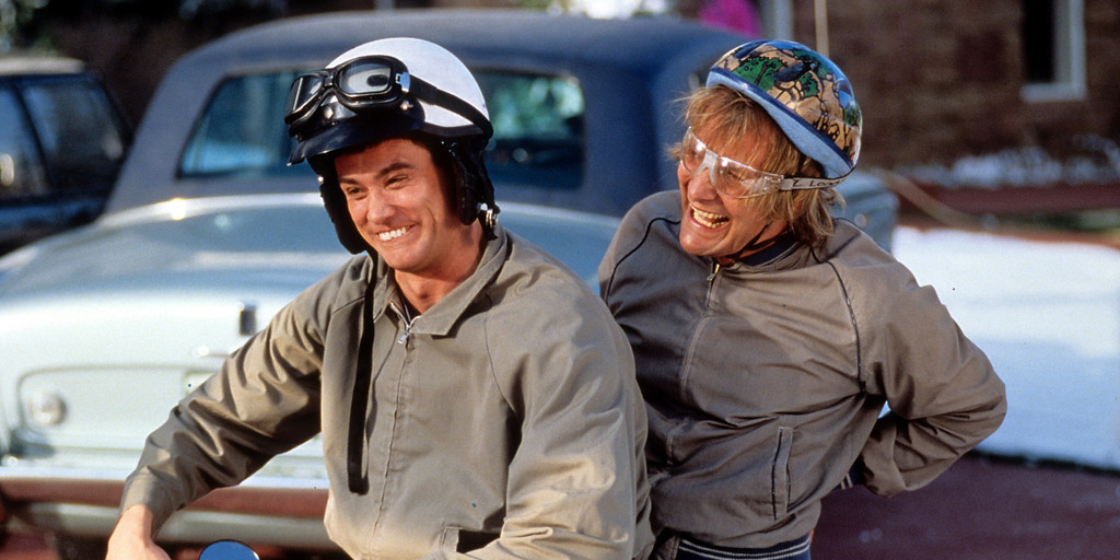 Jim Carrey and Jeff Daniels riding bike in a scene from the film 'Dumb & Dumber', 1994. (Photo by New Line Cinema/Getty Images)