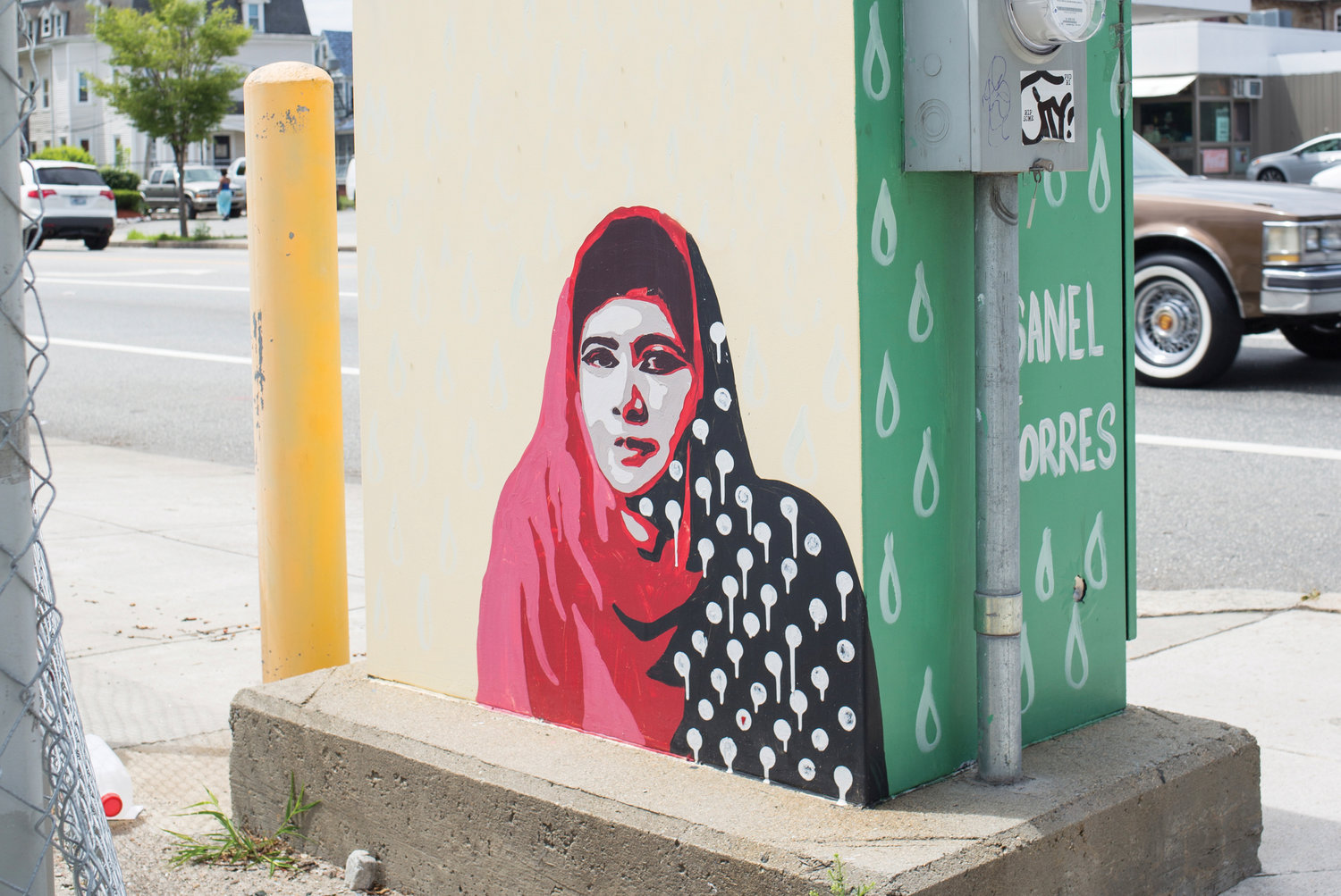 Malala’s polka dots drip to 
convey imperfection