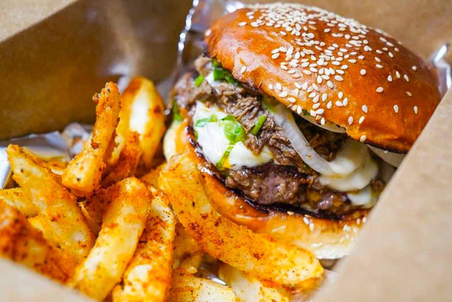 Latin American-inspired burger and fries from Trap Box
