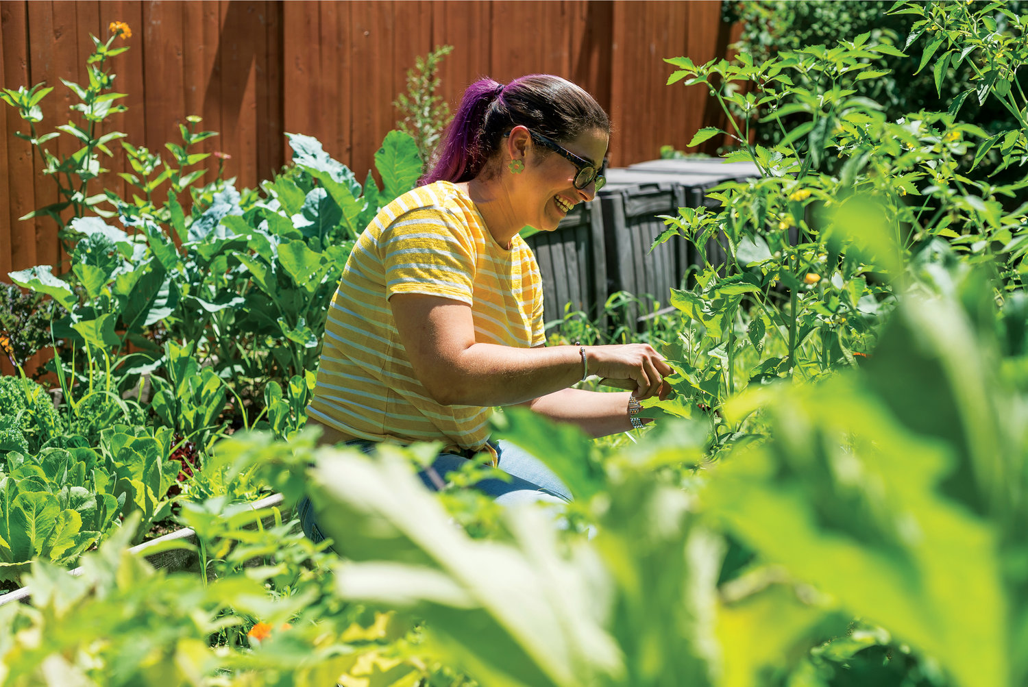 Pagán tending her home garden