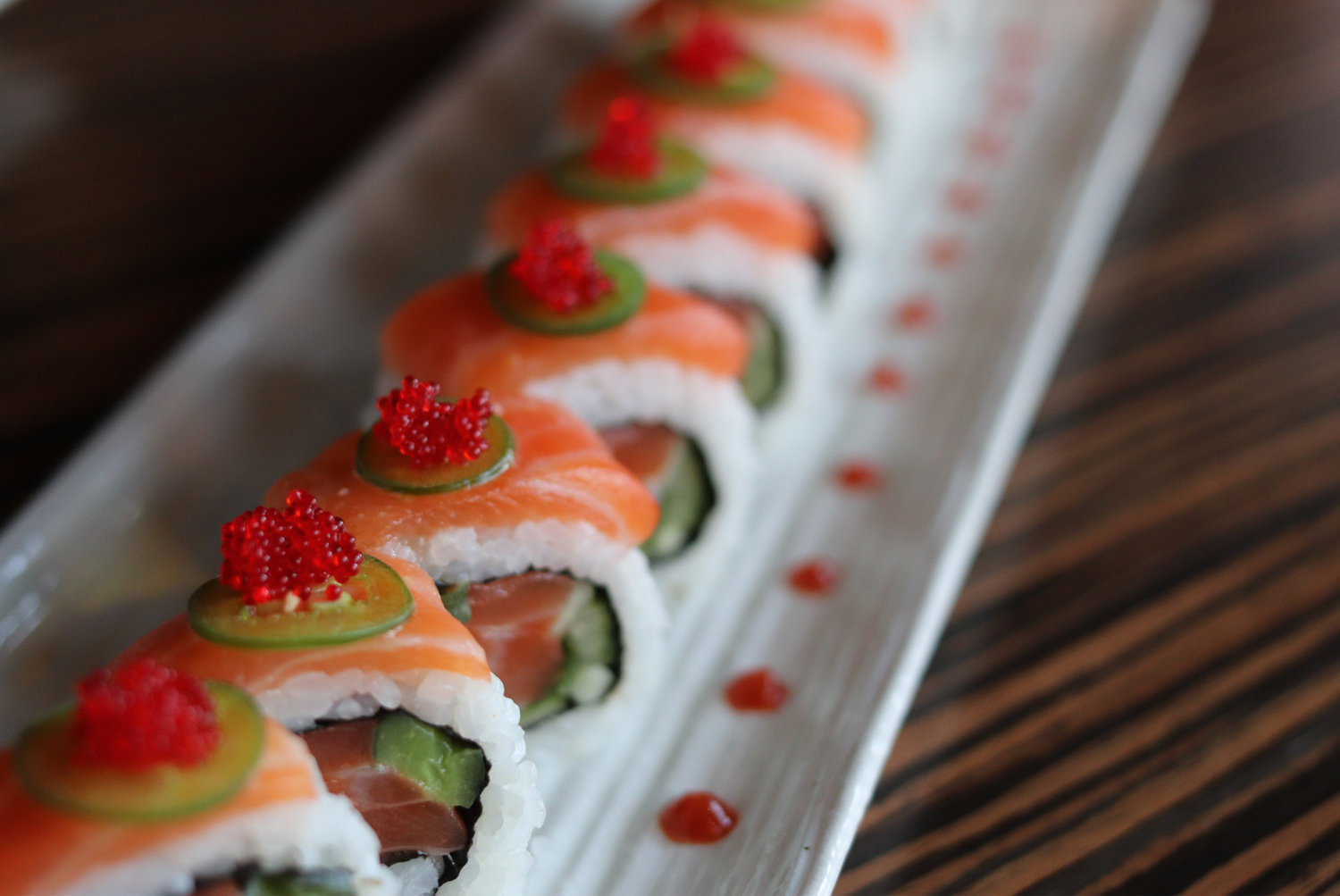 A Ten Prime roll uses vibrant masago as a finishing touch