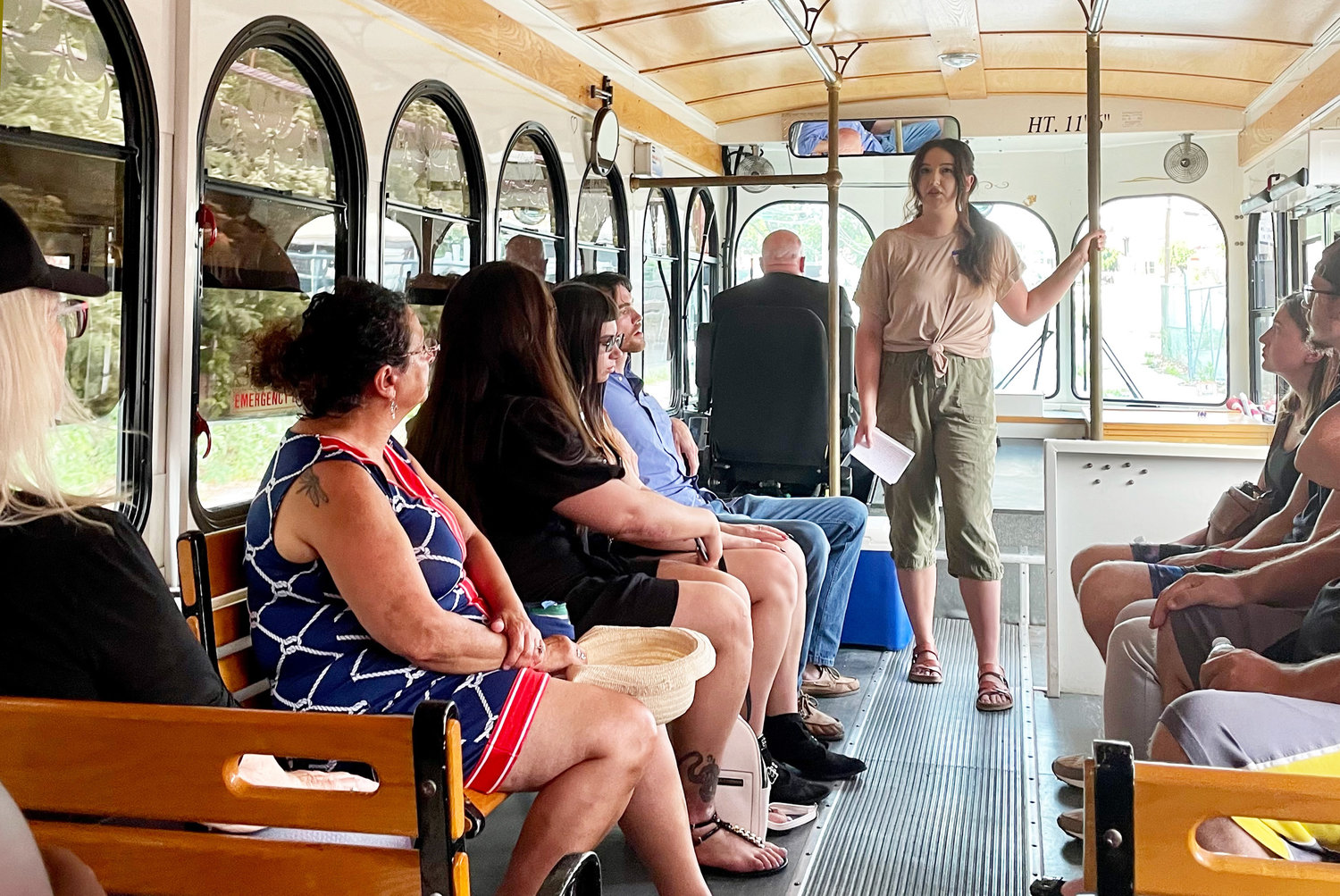 Shannon Hadfield, tour guide for Gallery Night Providence, addresses a trolley full of guests