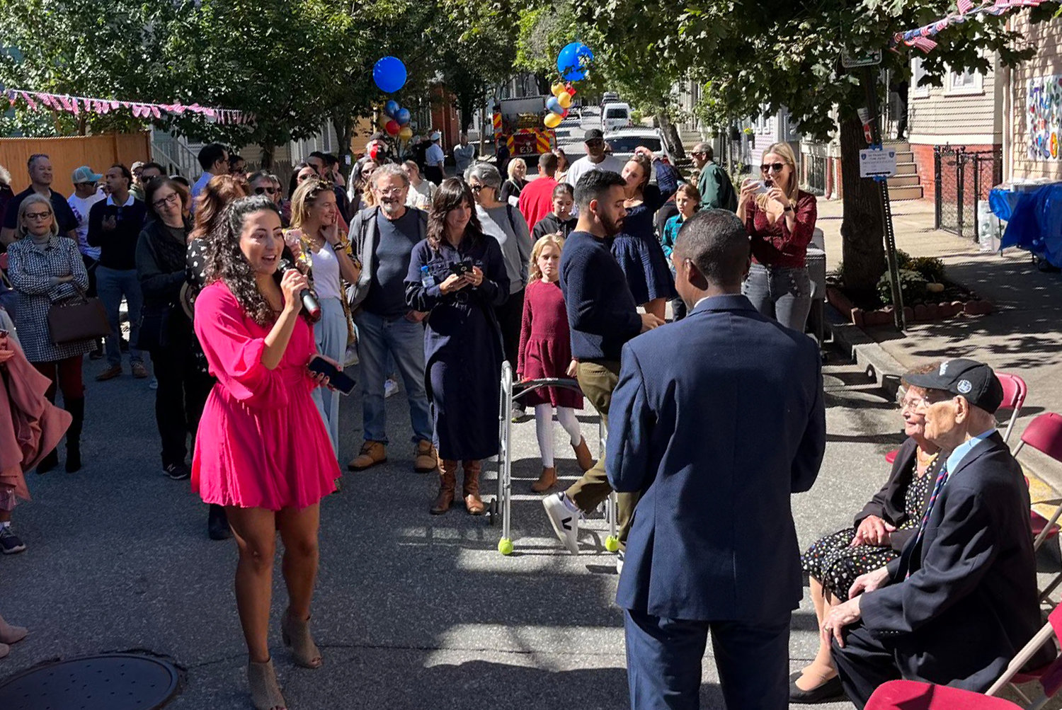 Fox Point neighbors celebrated Pedroso Way, an honorary street designation for Manuel Pedroso, owner of Friends Market and pillar of the community