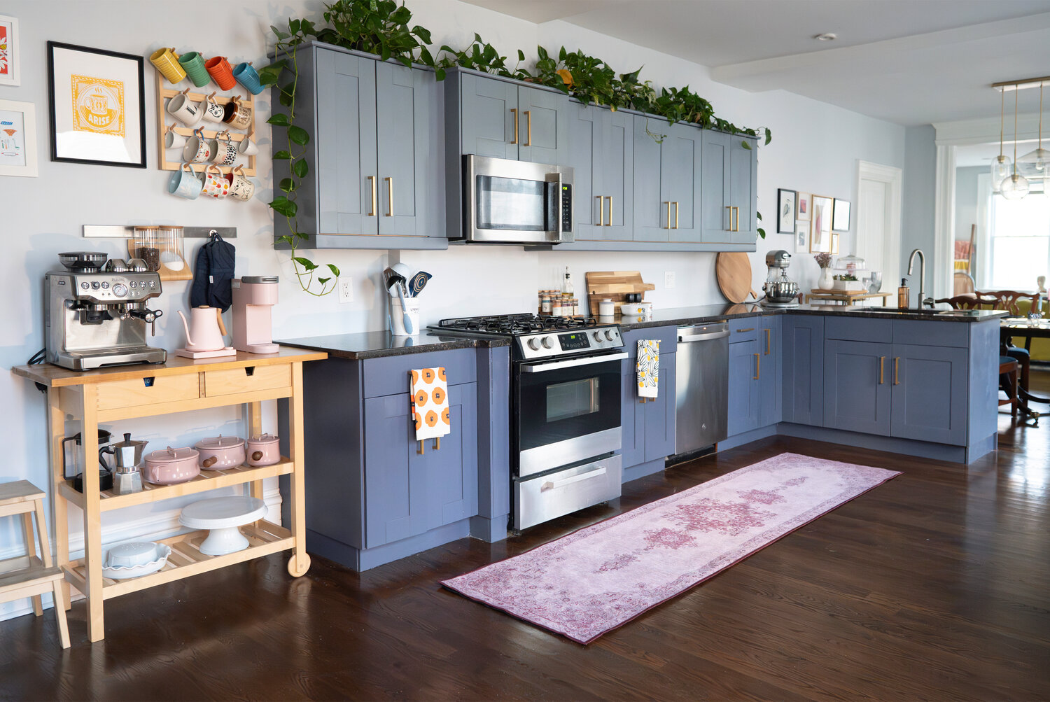 Natural woods and deep blues are a cohesive element throughout the home